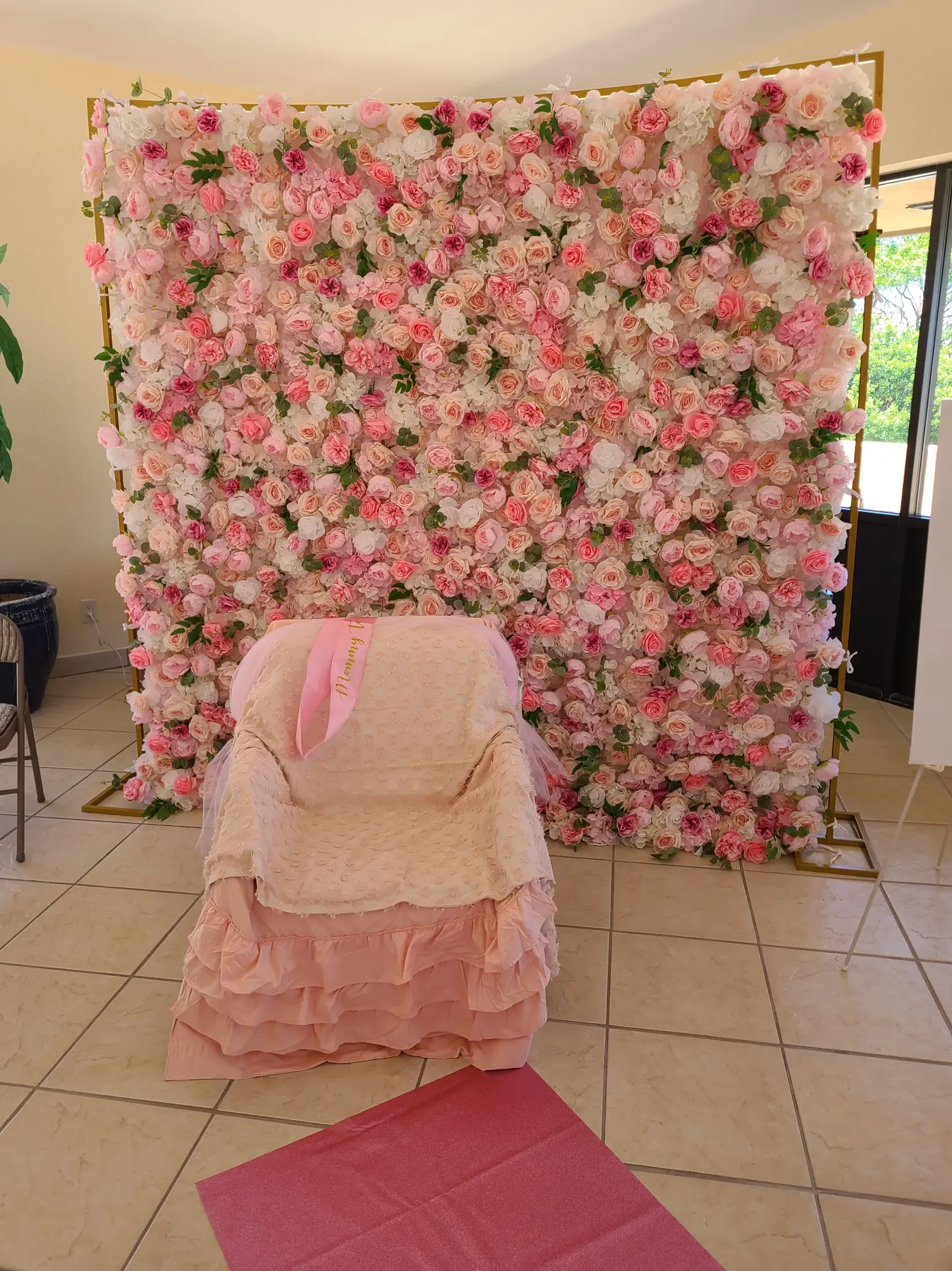 Baby shower flower wall, custom backdrop, decorative arch, and styled focal area