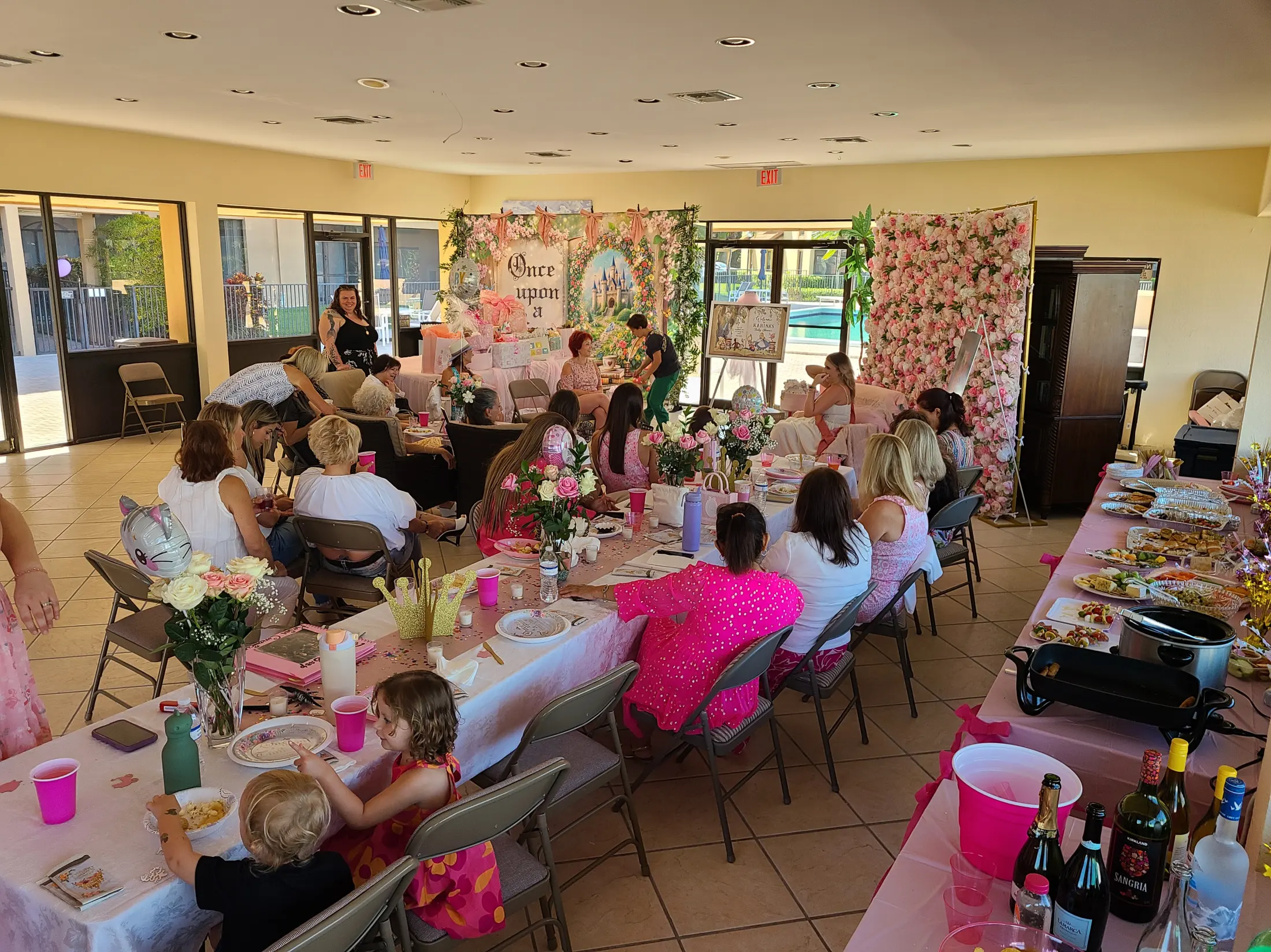 Completed luxury South Florida baby shower with guests, tables, focal installation, and event production