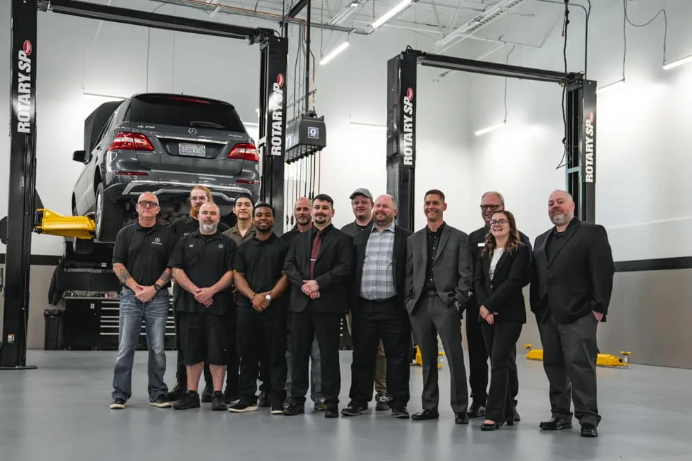 Luxury dealership grand opening event with corporate guests and brand presentation